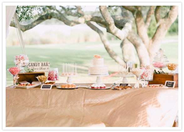 gold linen-covered dessert table