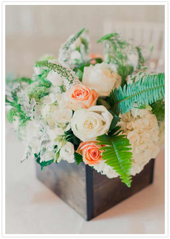 peach and ivory rose arrangements in wooden boxes