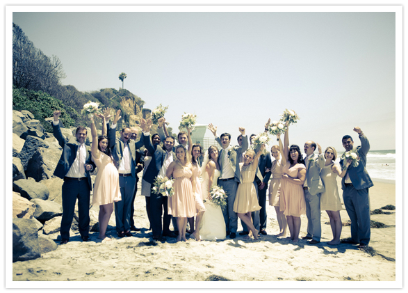 beach-side wedding party portrait