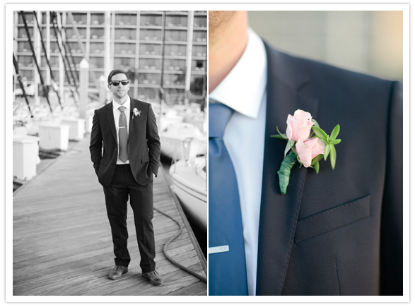 navy suit and sea-blue tie with simple pink rose boutonniere