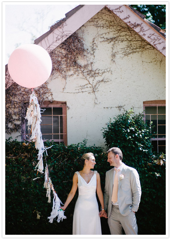 giant pink balloon wedding portrait
