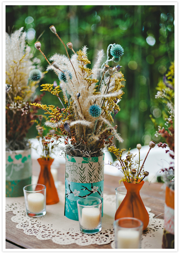 decorated tin can dried floral centerpieces and candles