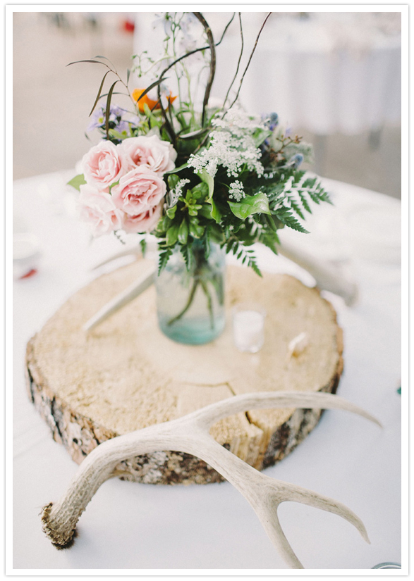antler, wood and floral centerpieces