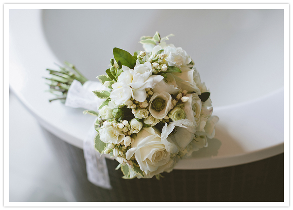 all white bouquet and lace ribbon
