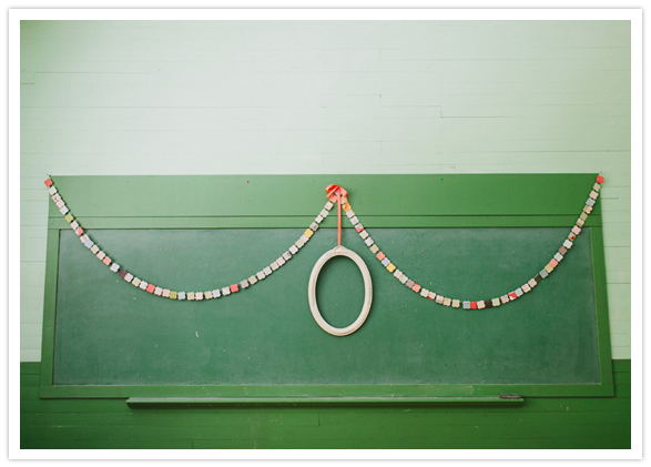 green chalkboard and colorful paper garland