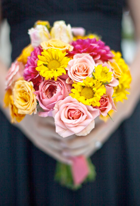 vibrant yellow, peach, and pink bridesmaid bouquets