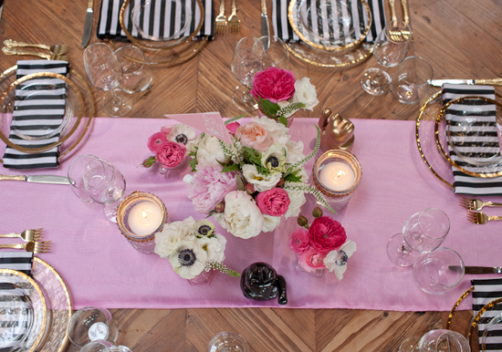 pink florals and linens and black and white striped napkins