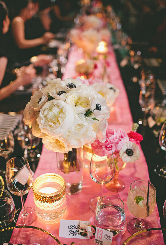 black and white anemones centerpieces and pink linens