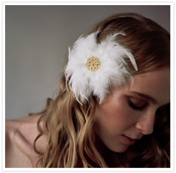 white feather and gold hairpiece 