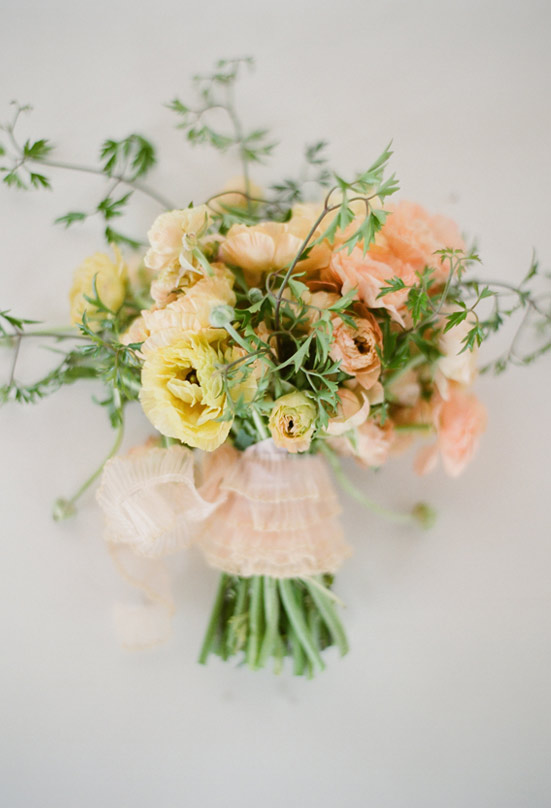 yellow and peach ranunculus bouquet photo by Elizabeth Messina 