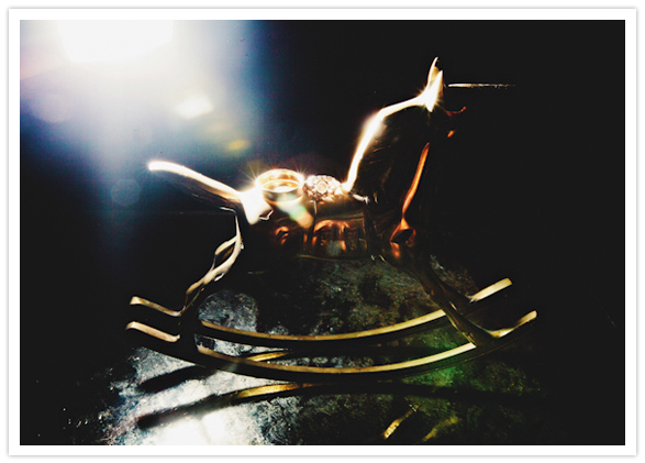 golden rocking horse and wedding rings