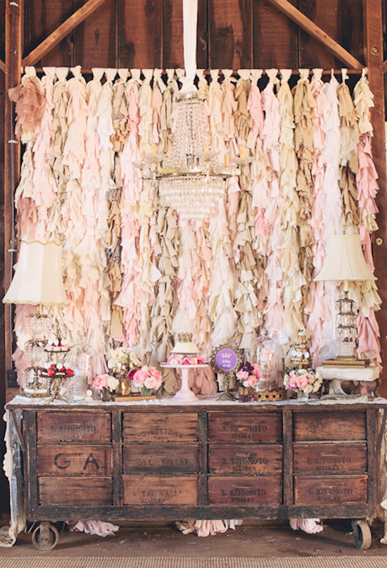 fringe fabric backdrop, rustic dessert table and dainty floral details