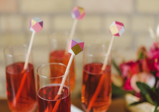 pink champagne with geometric stirrers