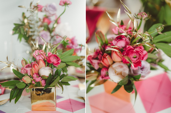 gold mirrored vase and pink and white flower arrangement