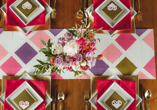 geometric purple, pink, white and gold table runner and square plates