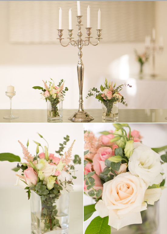 tapered candelabra and pink and white rose floral arrangement
