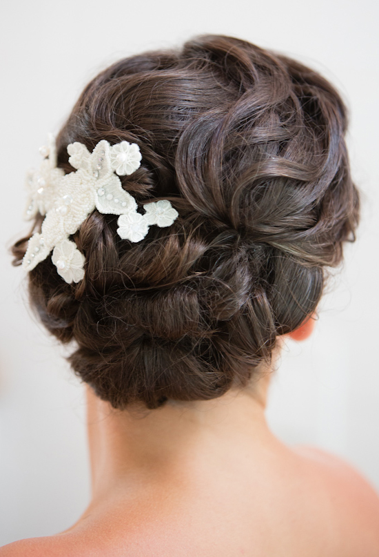 twisted up-do with white, beaded barrettes 