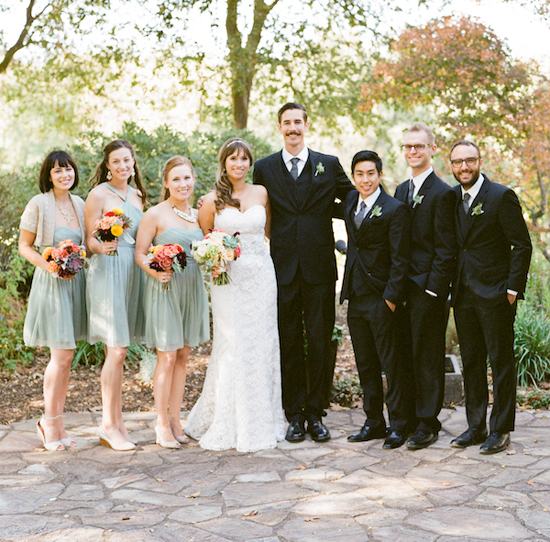 mint green bridesmaid dresses and black groomsmen suits
