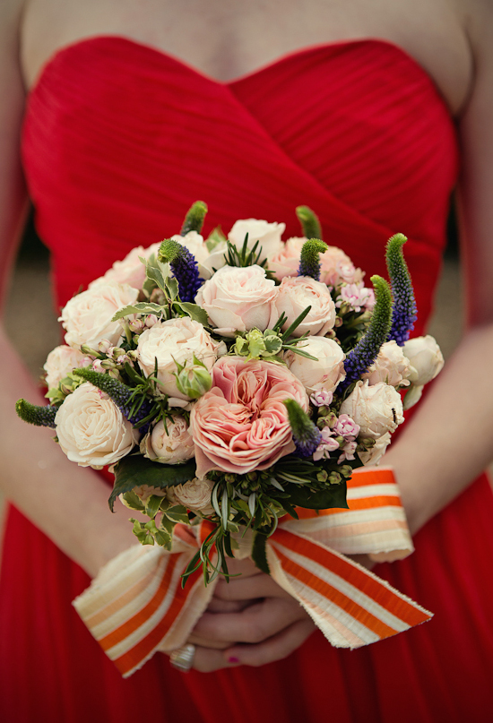 white, pink and green bouquets with a striped bow | Photo by Marianne Taylor