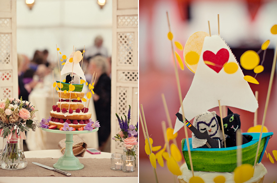 quirky fruit and frosting wedding cake and cat topper | Photo by Marianne Taylor