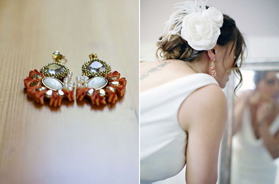 coral and pearl earrings and large white flower and feather headpiece | Photo by Anne Nunn Photography
