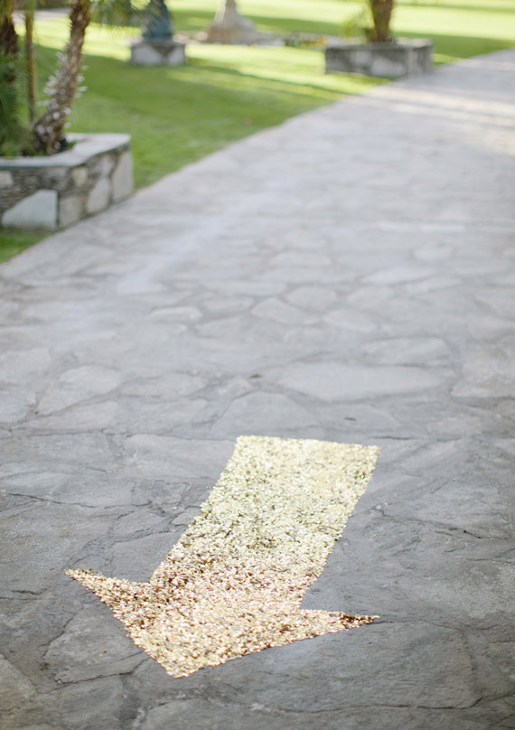 sequin directional sign | 100 Layer Cake