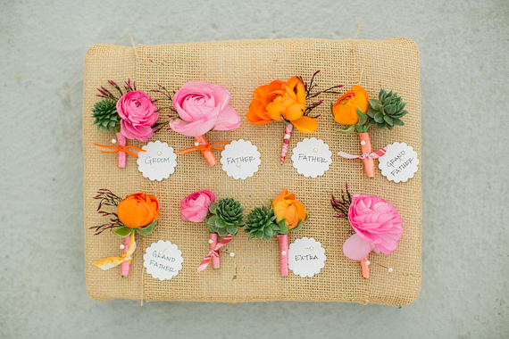  colorful ranunculus boutineers | photos by Apryl Ann | 100 Layer Cake