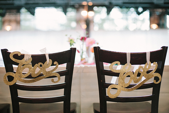 diy chair signage | photo by Sarah Joelle Photography | 100 Layer Cake 