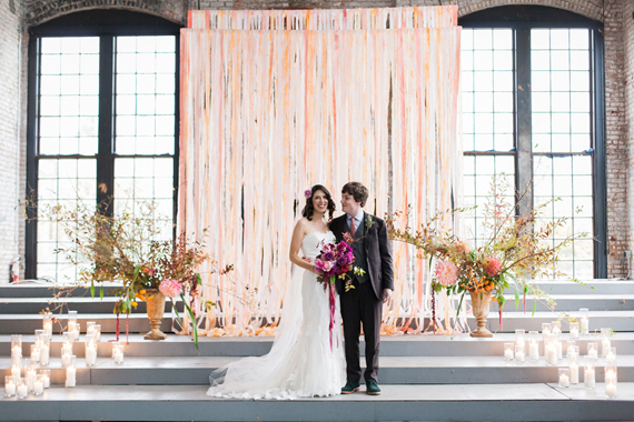 Ribbon ceremony backdrop | Photo by Lisa Berry | Read more - http://www.100layercake.com/blog/?p=76472