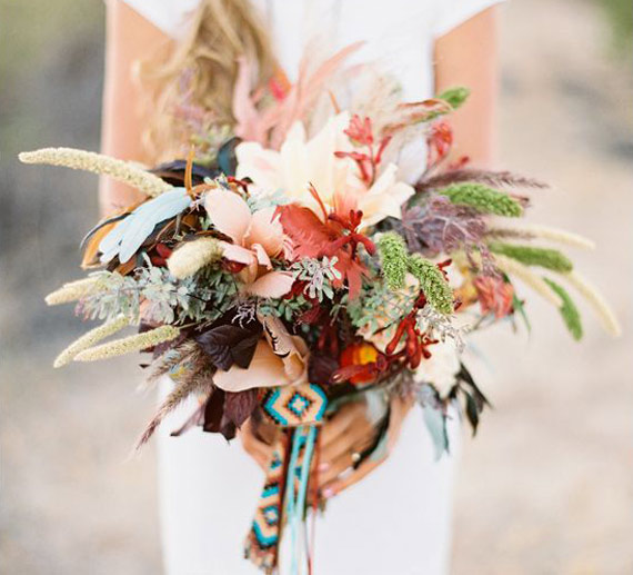 Feather and floral Southwestern inspired bouquet | 100 Layer Cake
