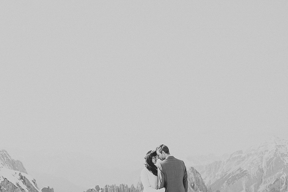 Snowy Alpine wedding portraits | Photo by Roland Faistenberger Photography | Read more -  http://www.100layercake.com/blog/?p=82624 