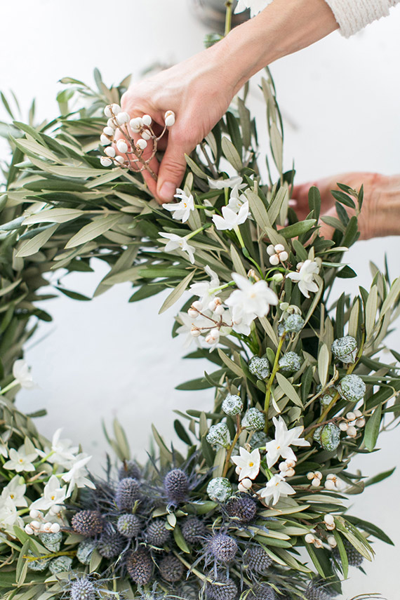 DIY Blue and White Olive holiday wreath | Photo by Josh Gruetzmacher | Design and styling: Type A Society for 100 Layer Cake 