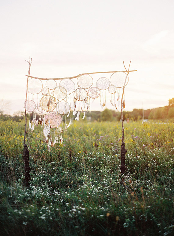 Dreamcatcher wedding decor | Photo by Olivia Leigh Photographie | Read more - http://www.100layercake.com/blog/wp-content/uploads/2015/04/Bohemian-ranch-wedding-inspiration