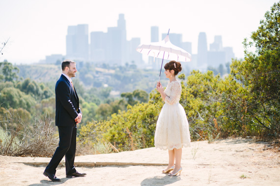 Wedding umbrella prop | Photo by Mary Costa Photography | Read more -  http://www.100layercake.com/blog/wp-content/uploads/2015/04/DIY-Elysian-Los-Angeles-Wedding