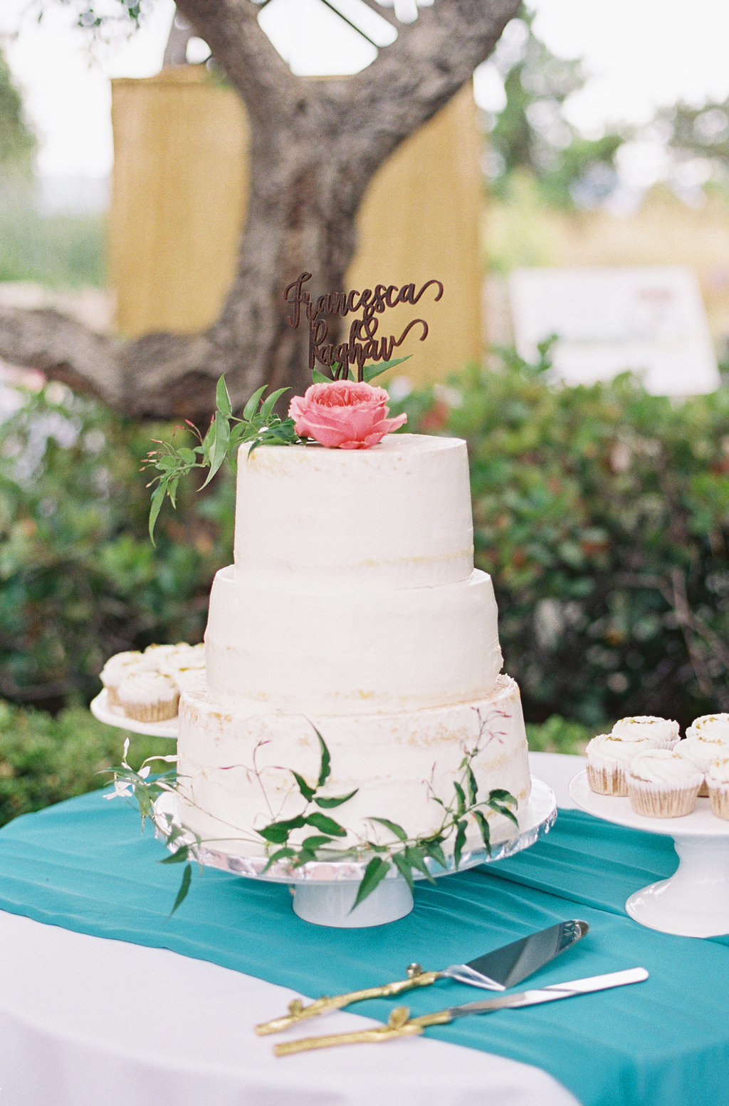 white wedding cake with peonies