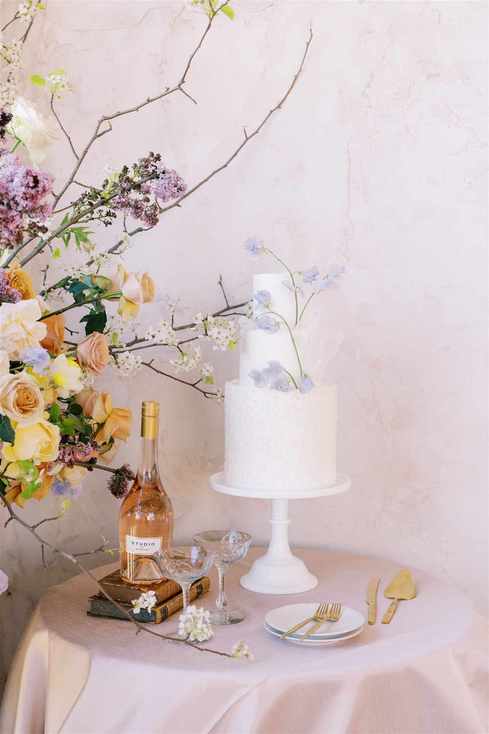 Romantic spring pastel wedding cake table at Villa Antonia