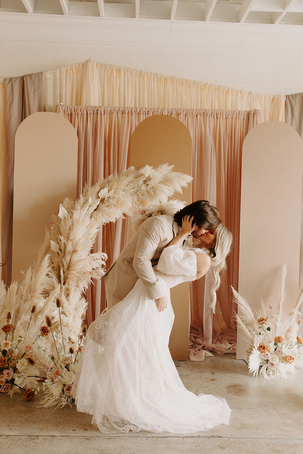 Modern boho luxe wedding ideas with pampas grass and dried palms