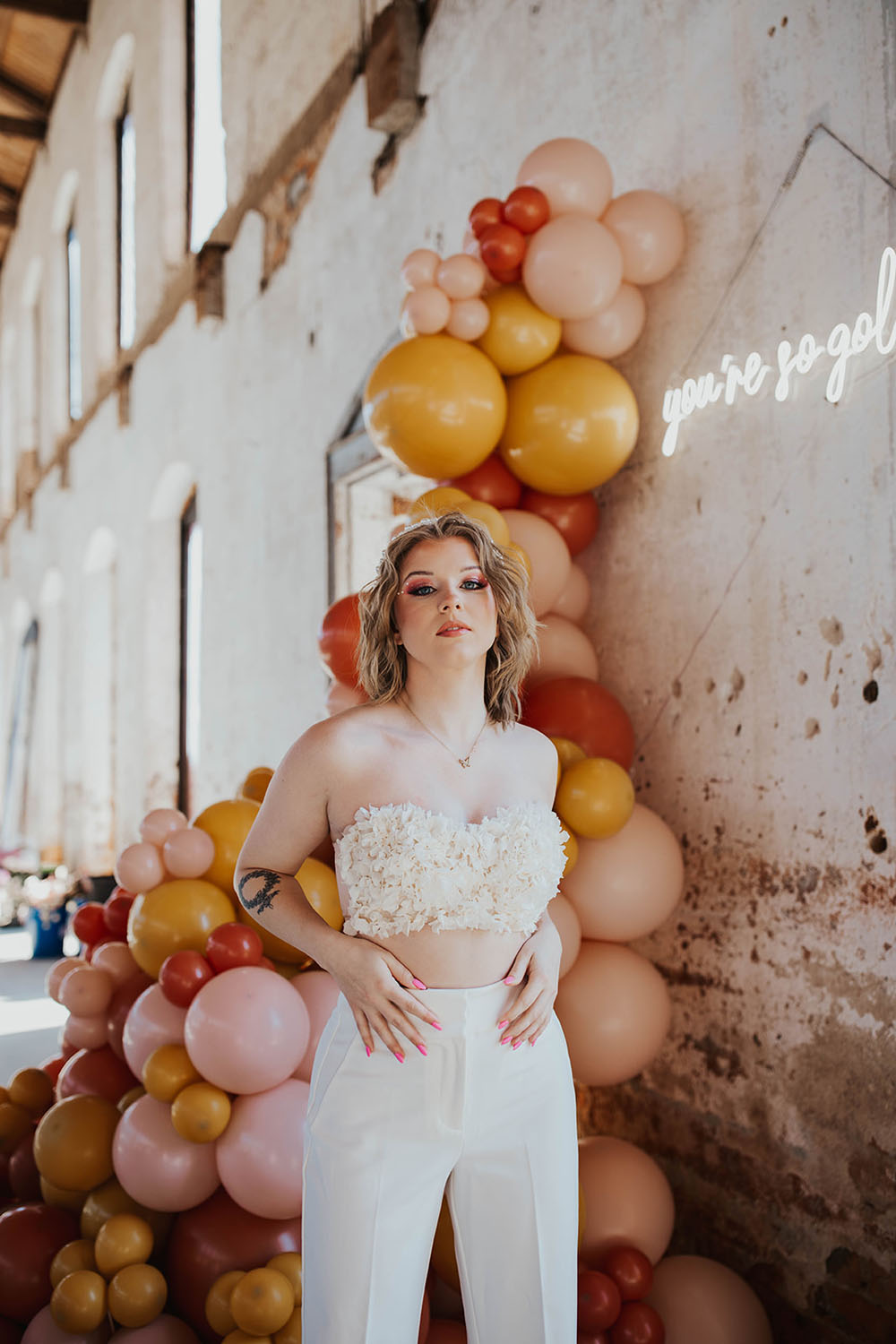 Groovy mod disco-themed wedding overflowing with flowers