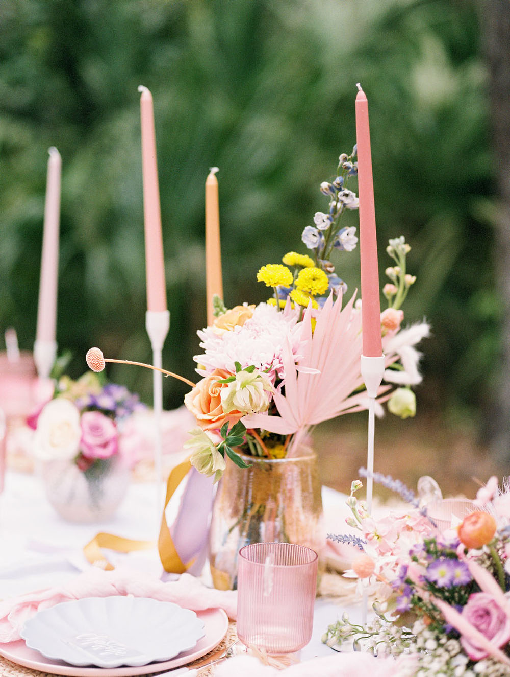 Gorgeous pink, peach, and blue wedding candles