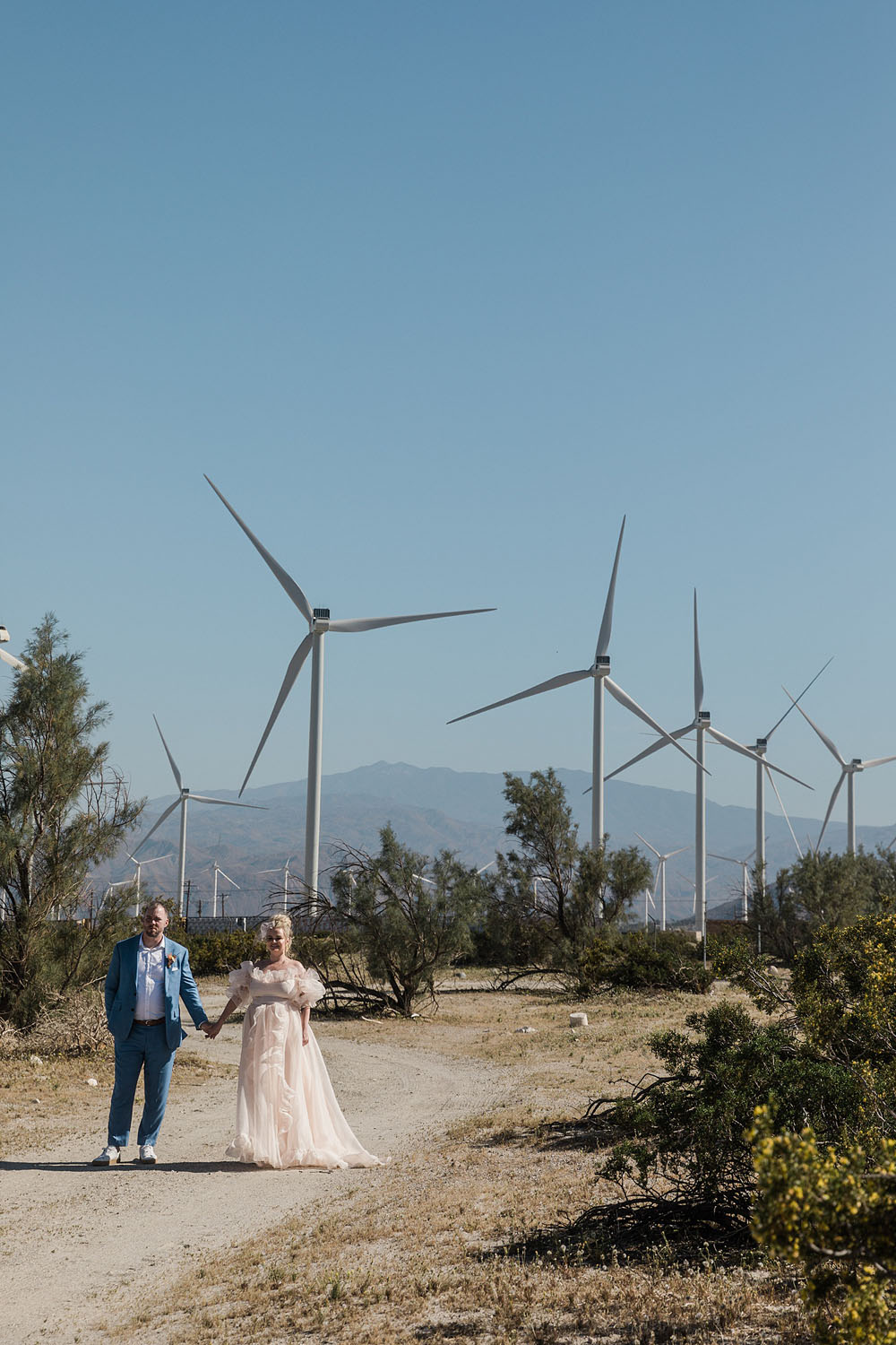 Colorful Ace Hotel Palm Springs wedding with a pool party