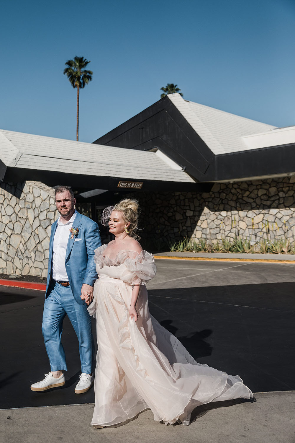 Colorful Ace Hotel Palm Springs wedding with a pool party
