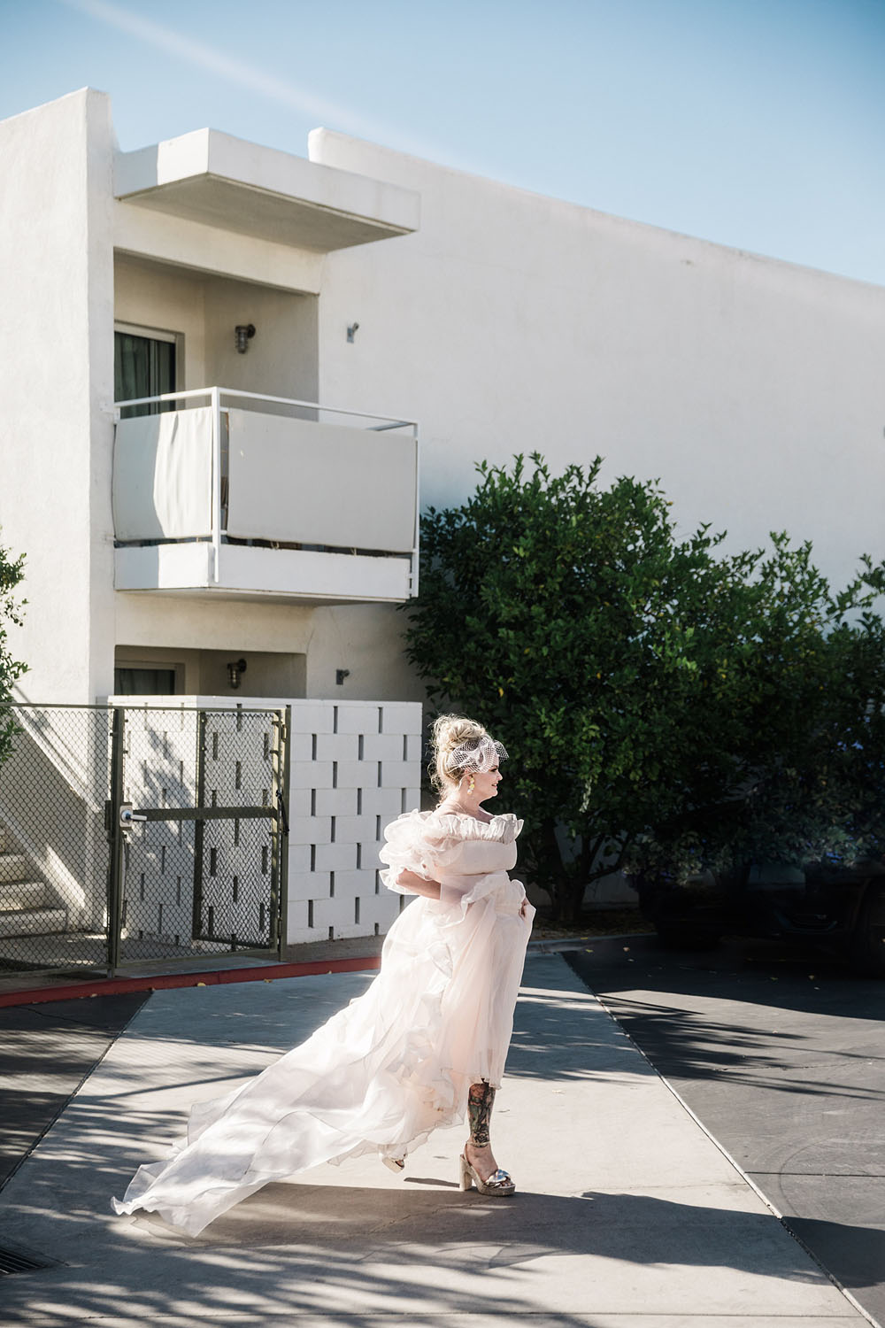 Colorful Ace Hotel Palm Springs wedding with a pool party