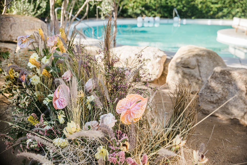 Colorful Ace Hotel Palm Springs wedding with a pool party
