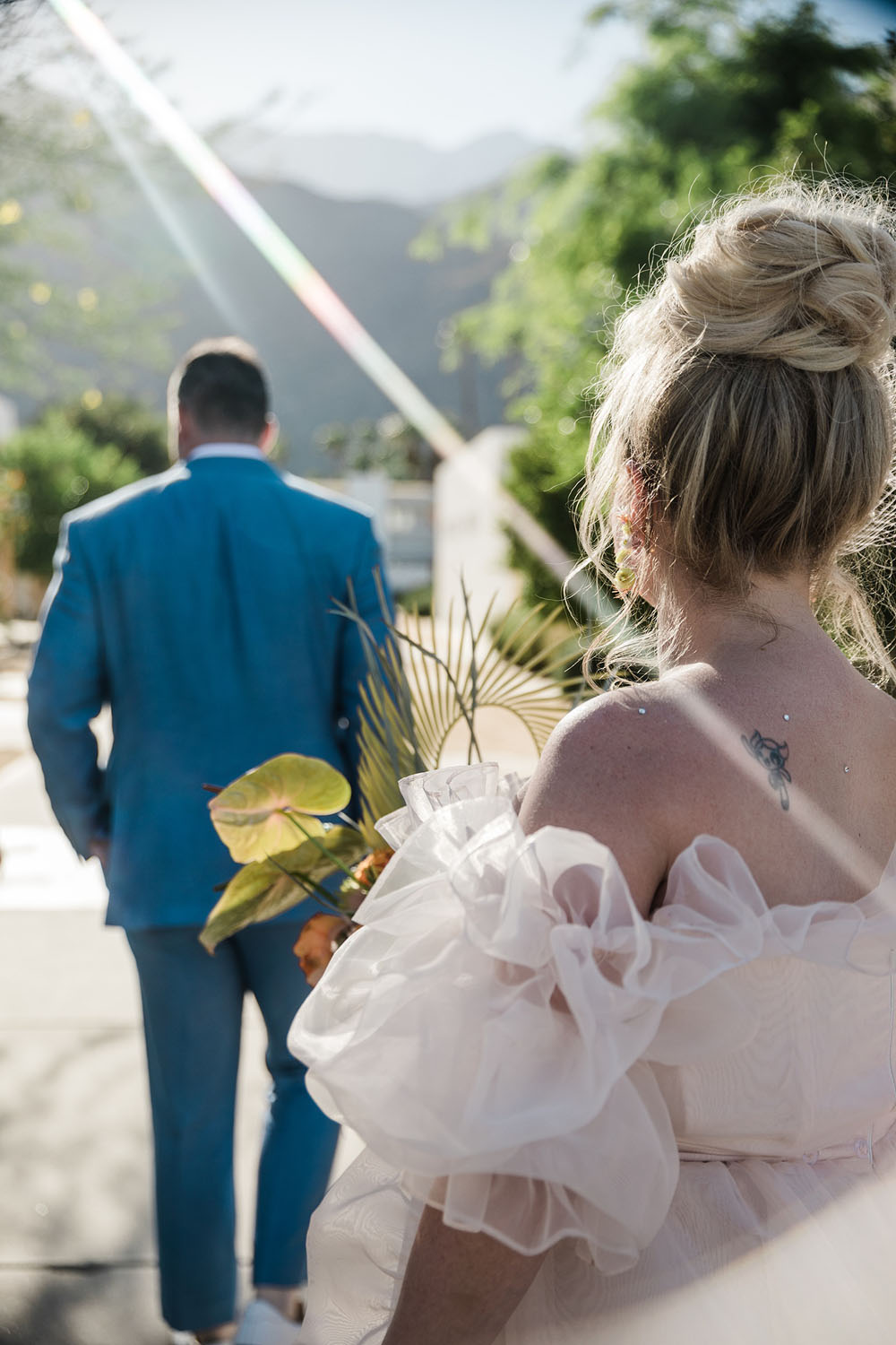 Colorful Ace Hotel Palm Springs wedding with a pool party
