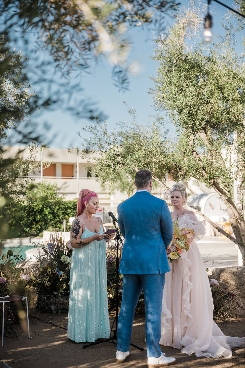 Colorful Ace Hotel Palm Springs wedding with a pool party