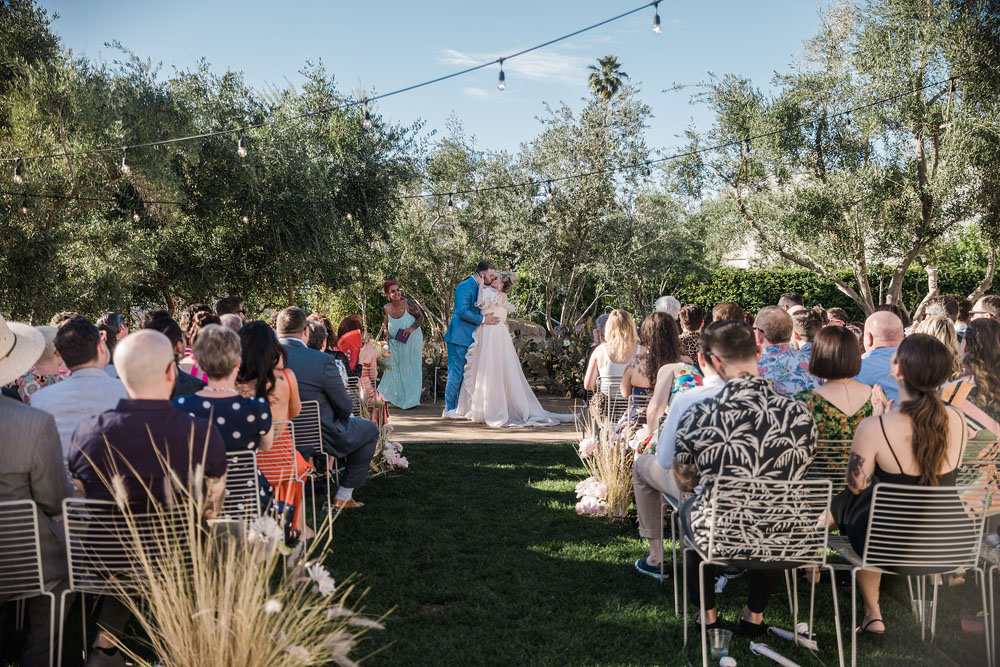 Colorful Ace Hotel Palm Springs wedding with a pool party