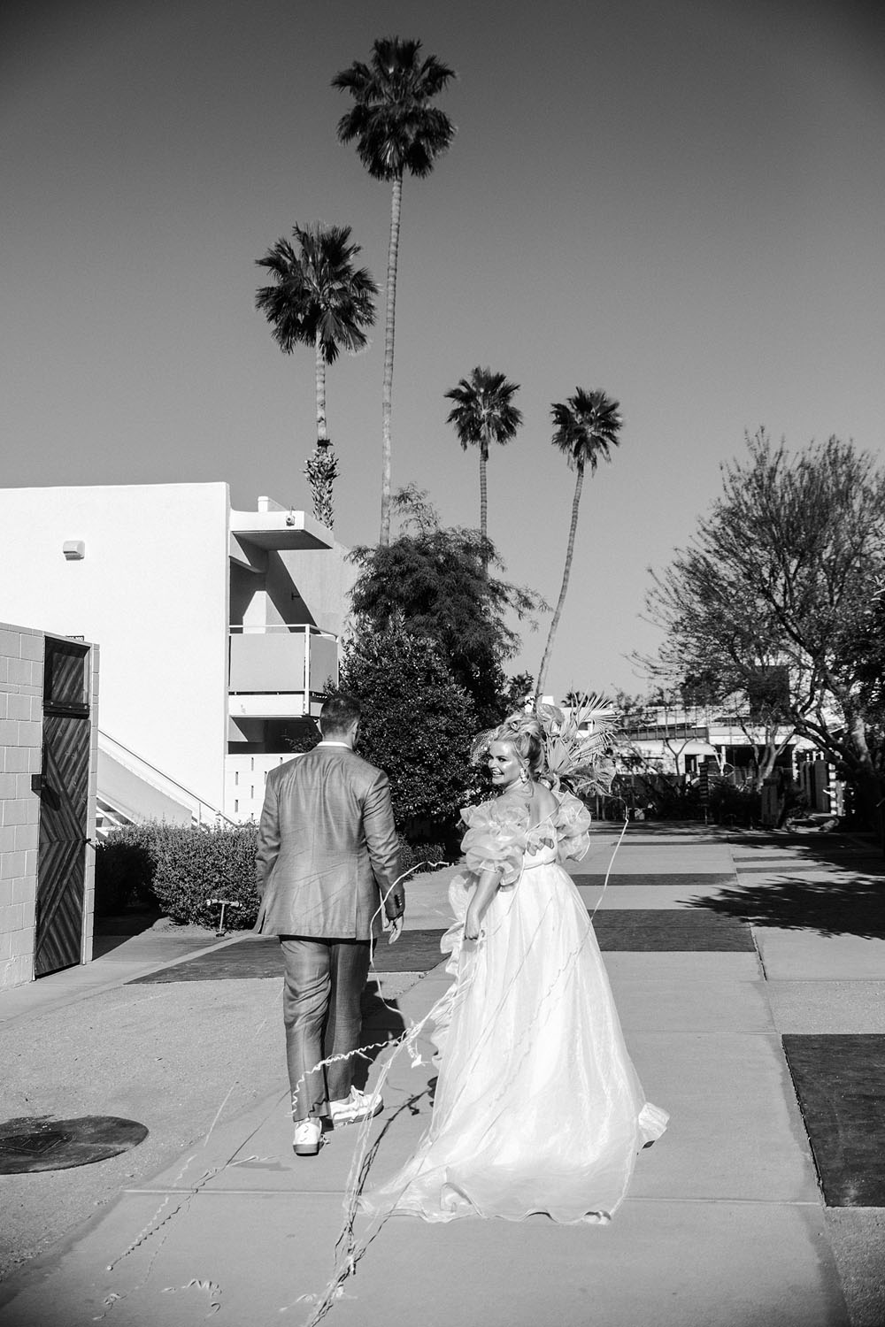 Colorful Ace Hotel Palm Springs wedding with a pool party