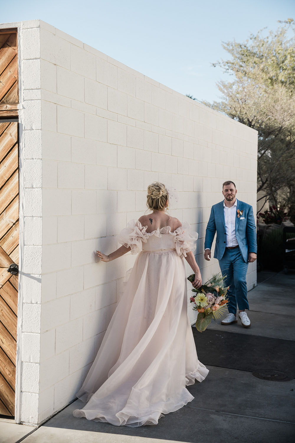 Colorful Ace Hotel Palm Springs wedding with a pool party