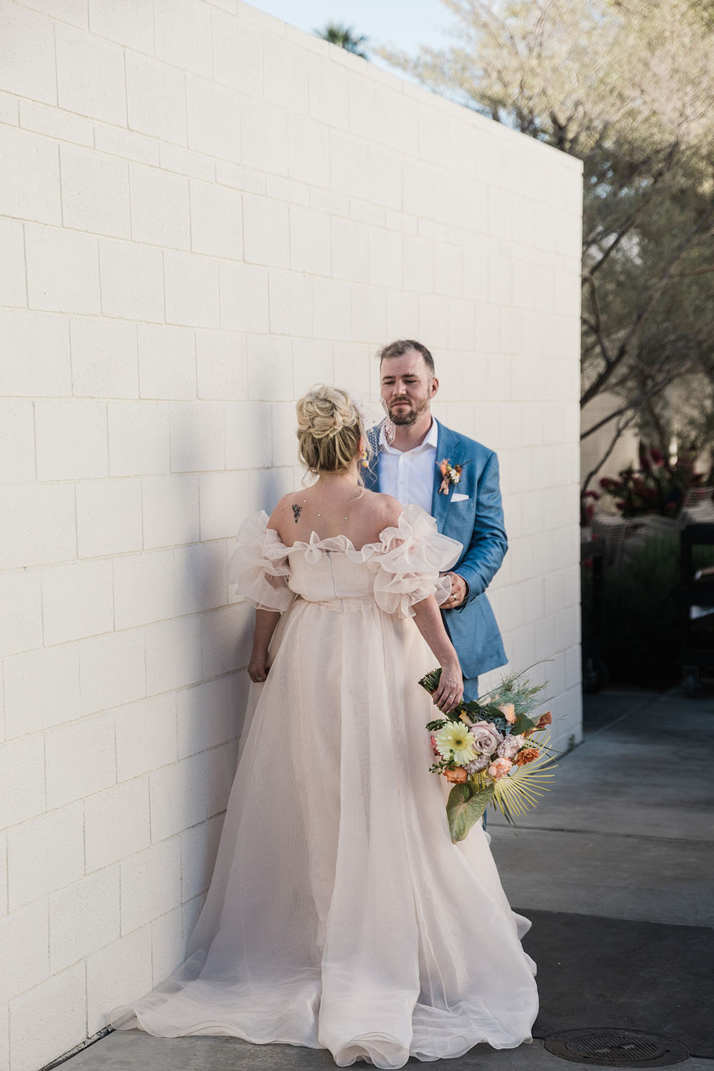 Colorful Ace Hotel Palm Springs wedding with a pool party