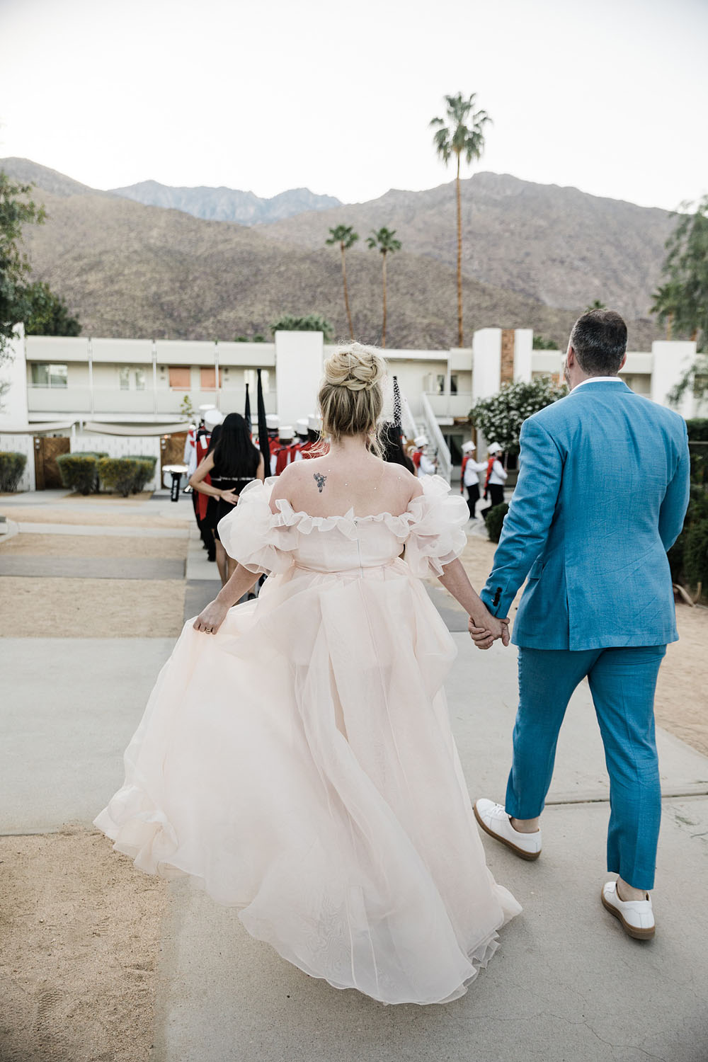 Colorful Ace Hotel Palm Springs wedding with a pool party